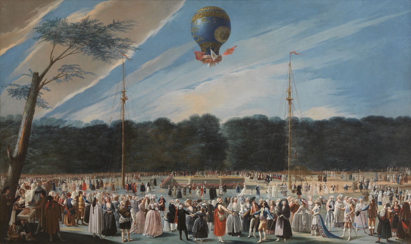 Antonio Carnicero’s painting of a blue and gold Montgolfier balloon rising over a crowd in the gardens of Aranjuez, between two tall masts.